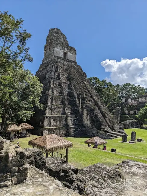 Discover the iconic Temple of the Great Jaguar at Tikal, nestled amidst lush greenery in Guatemala.