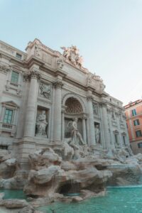 Stunning view of the iconic Trevi Fountain in Rome, capturing its architectural beauty on a sunny day.